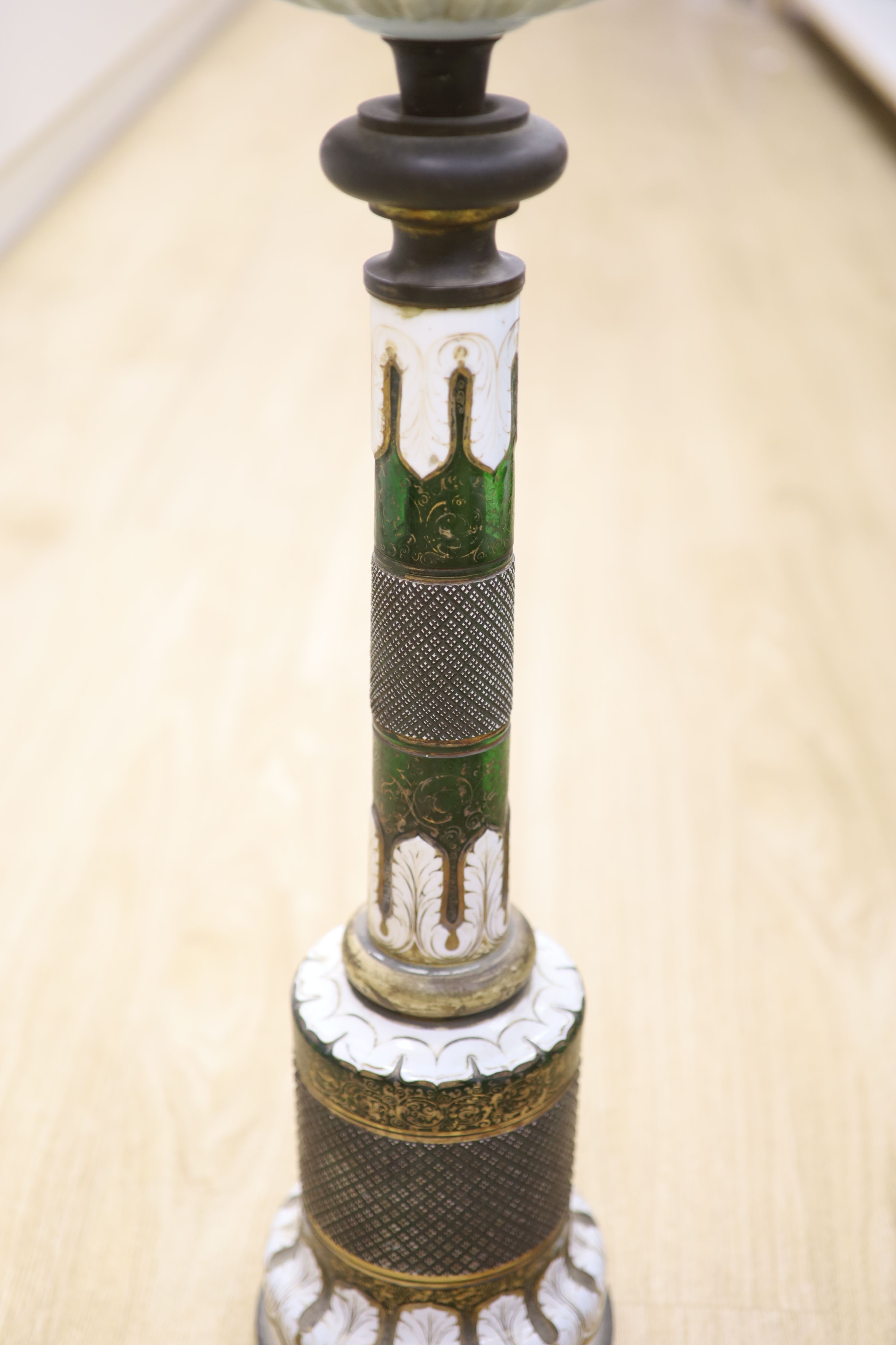 A 19th century Bohemian overlay glass oil lamp, height 99cm